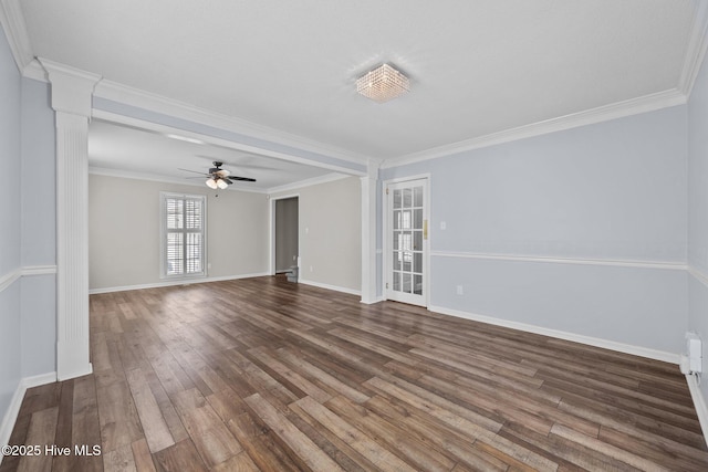 unfurnished room featuring ceiling fan, dark wood-type flooring, crown molding, and ornate columns