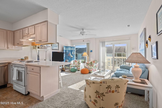 kitchen featuring ceiling fan, dishwasher, white electric range, light colored carpet, and a textured ceiling