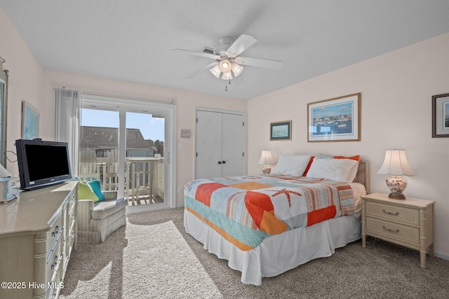 bedroom with access to exterior, ceiling fan, carpet floors, a textured ceiling, and a closet