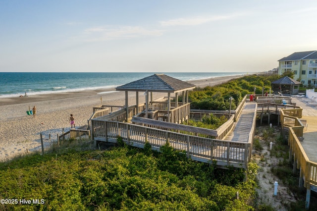 property view of water featuring a gazebo and a view of the beach