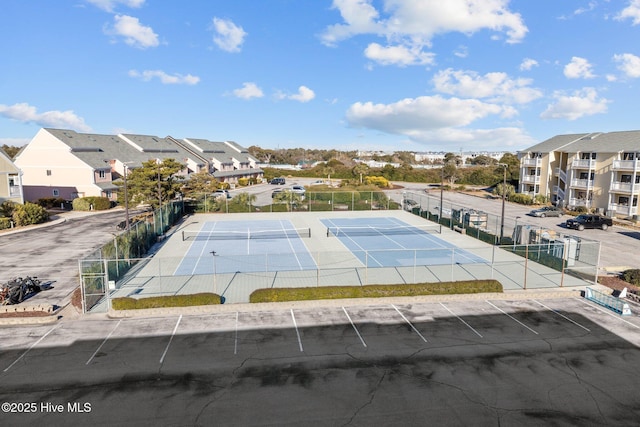 view of pool featuring tennis court