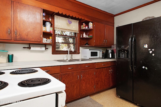 kitchen featuring white appliances, ornamental molding, and sink