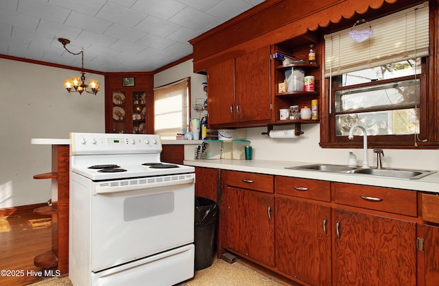 kitchen with sink, hanging light fixtures, ornamental molding, a notable chandelier, and electric stove