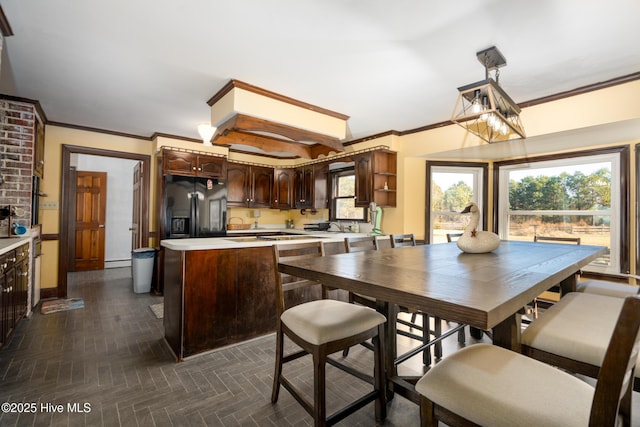 dining area featuring ornamental molding