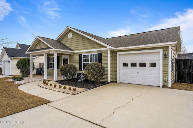 ranch-style house with a garage and covered porch