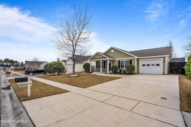 single story home featuring a front lawn and a garage