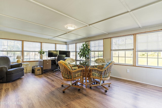 sunroom featuring coffered ceiling