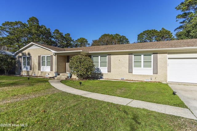 ranch-style house featuring a garage and a front yard