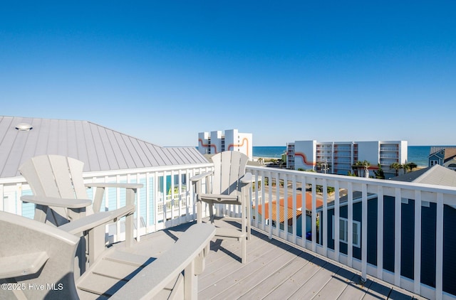 deck featuring a water view