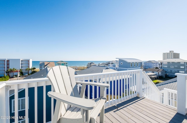 deck featuring a water view