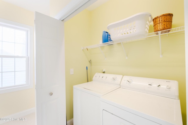 laundry room featuring separate washer and dryer