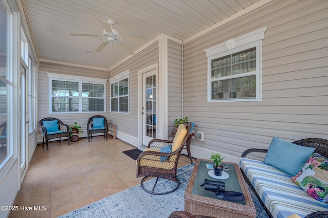 view of patio / terrace with an outdoor living space and ceiling fan