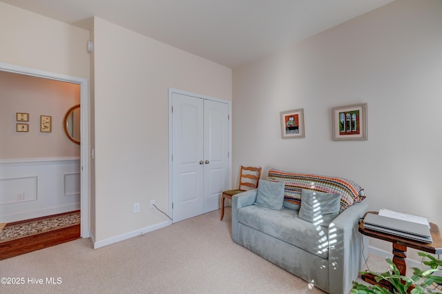 sitting room with light colored carpet