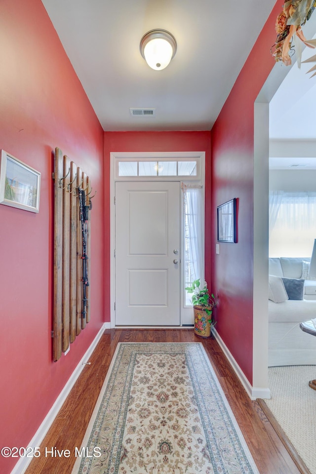 foyer featuring wood-type flooring