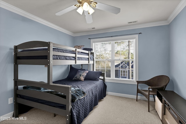 bedroom with ceiling fan, ornamental molding, and light carpet