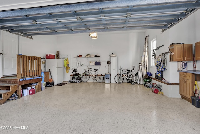 garage featuring white refrigerator