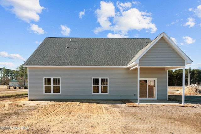 rear view of house with a patio