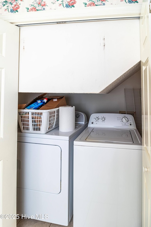 laundry room with washer and clothes dryer