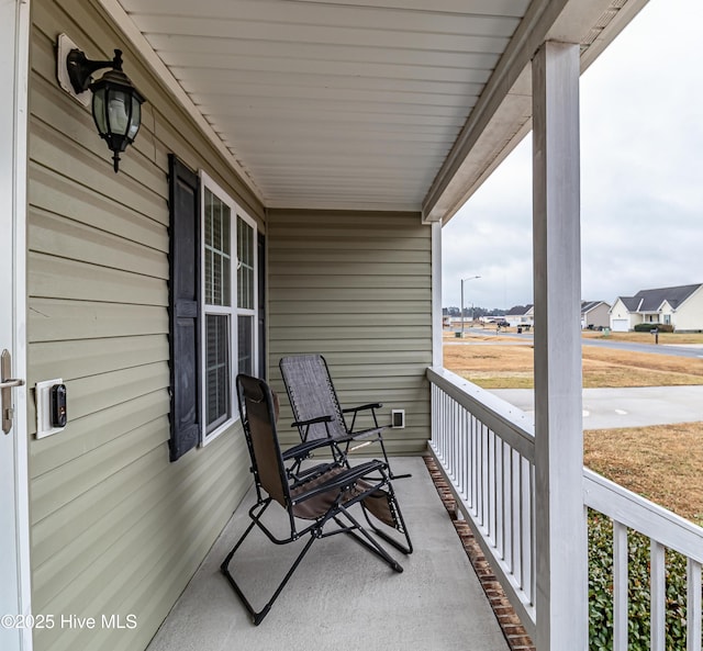 balcony featuring a porch