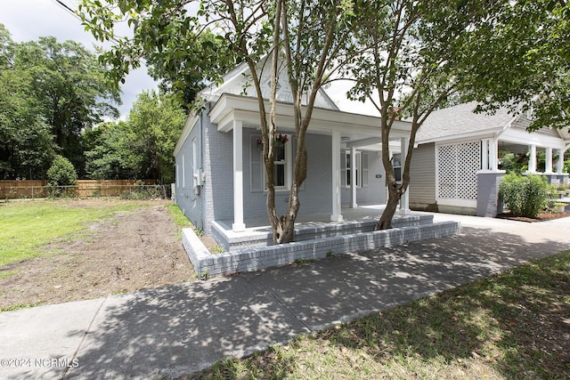 bungalow-style house featuring covered porch