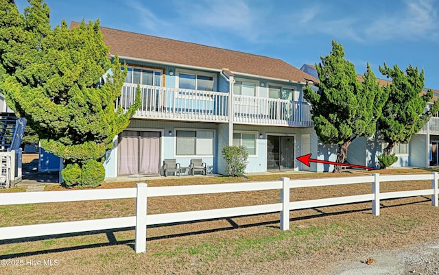 exterior space featuring a balcony