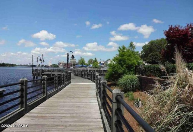 view of dock with a water view