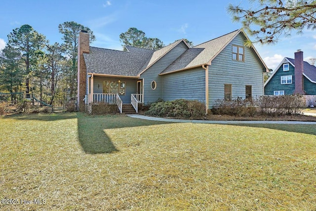 view of front of house featuring a porch and a front lawn