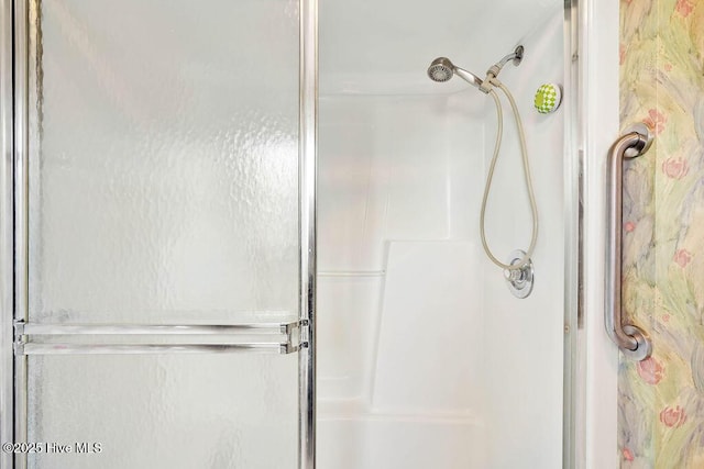 bathroom featuring an enclosed shower