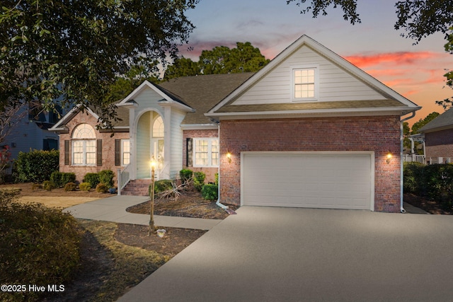 single story home featuring a garage