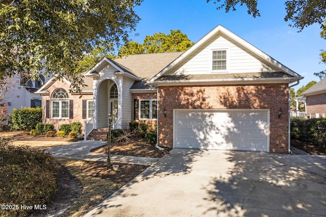 4379 Gauntlet Dr, Southport, NC 28461 - traditional home featuring brick siding, driveway, and an attached garage