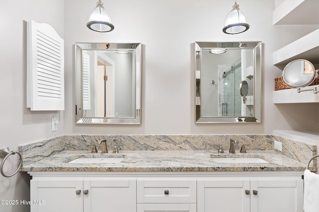 4379 Gauntlet Dr, Southport, NC 28461 - bathroom with double vanity and a shower stall