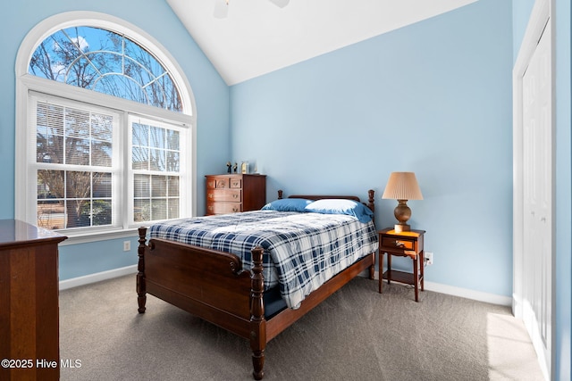 4379 Gauntlet Dr, Southport, NC 28461 - carpeted bedroom with vaulted ceiling, baseboards, and ceiling fan