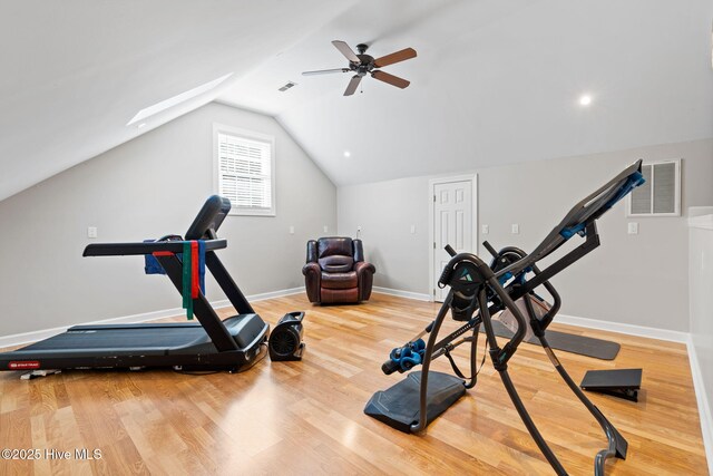 living room featuring hardwood / wood-style flooring, ceiling fan, high vaulted ceiling, and french doors