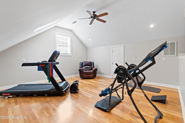 4379 Gauntlet Dr, Southport, NC 28461 - exercise area with wood finished floors, a ceiling fan, lofted ceiling, a skylight, and baseboards