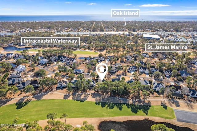 4379 Gauntlet Dr, Southport, NC 28461 - aerial view of property and surrounding area with a local golf course, nearby suburban area, and a nearby body of water