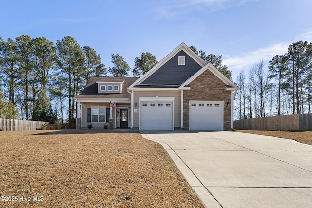 craftsman house with a garage and a porch