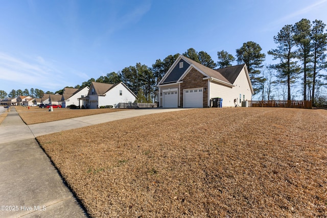 view of yard featuring a garage