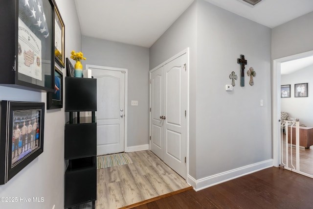 entrance foyer featuring hardwood / wood-style floors