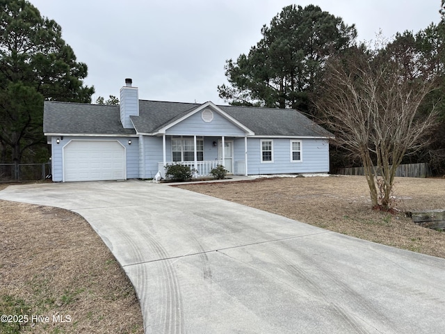 ranch-style home featuring a porch and a garage