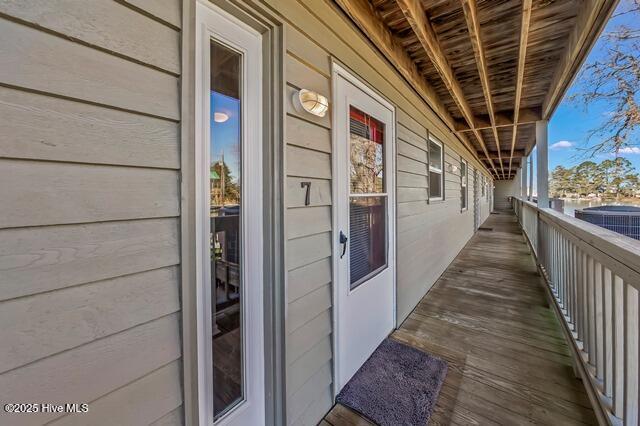 entrance to property with a balcony