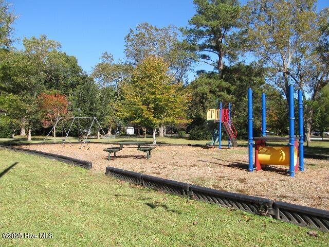 view of community featuring a playground