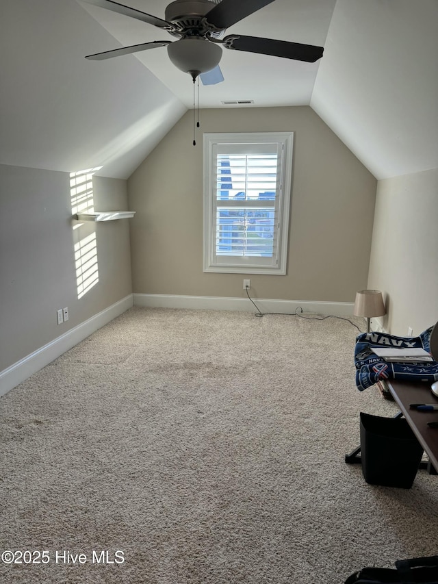 bonus room with ceiling fan, carpet, and lofted ceiling