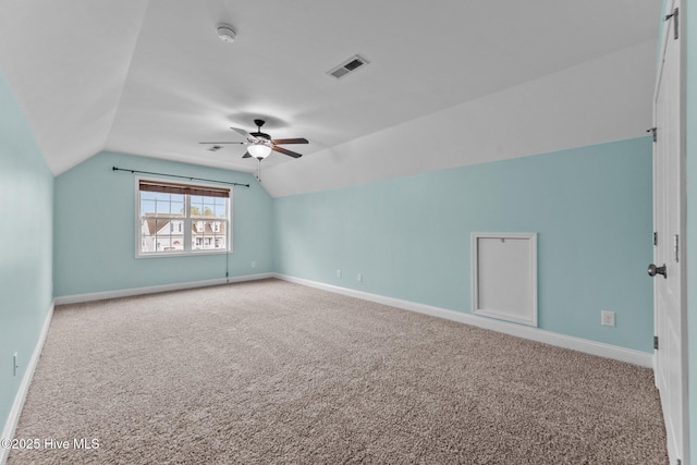 bonus room featuring lofted ceiling, ceiling fan, and carpet floors