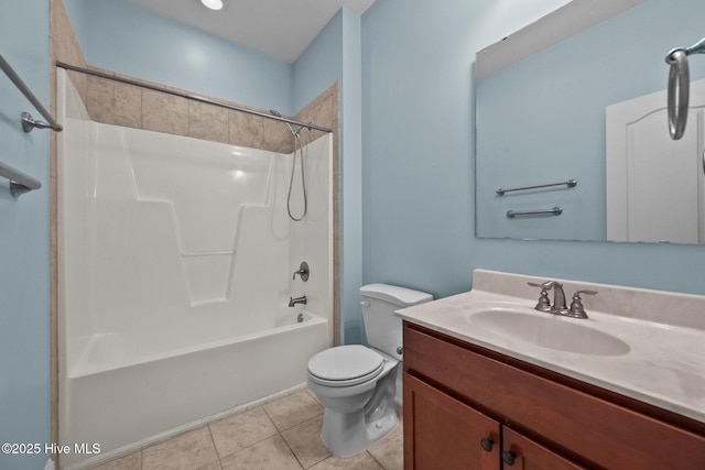 full bathroom featuring tile patterned flooring, vanity, toilet, and tub / shower combination