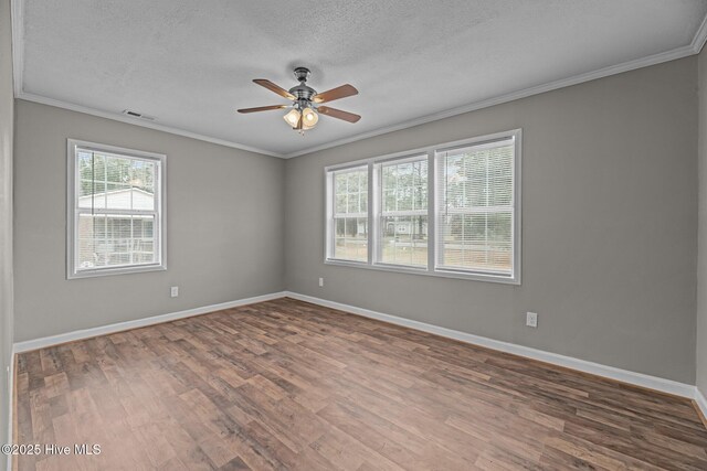 living room with hardwood / wood-style flooring, ceiling fan, and ornamental molding