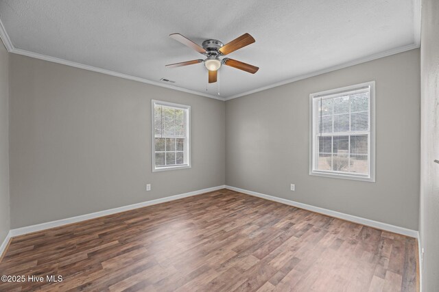 entrance foyer featuring hardwood / wood-style floors and crown molding