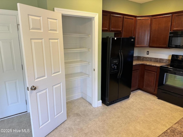 kitchen with black appliances