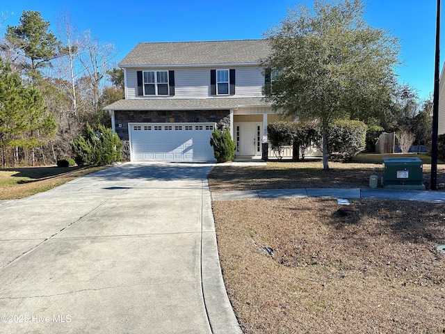 view of front property with a garage