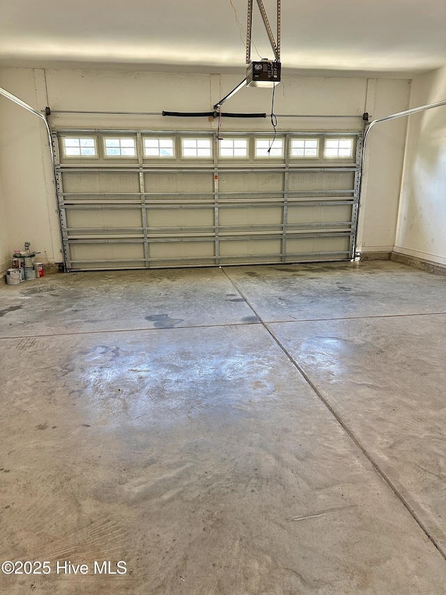 garage featuring a garage door opener