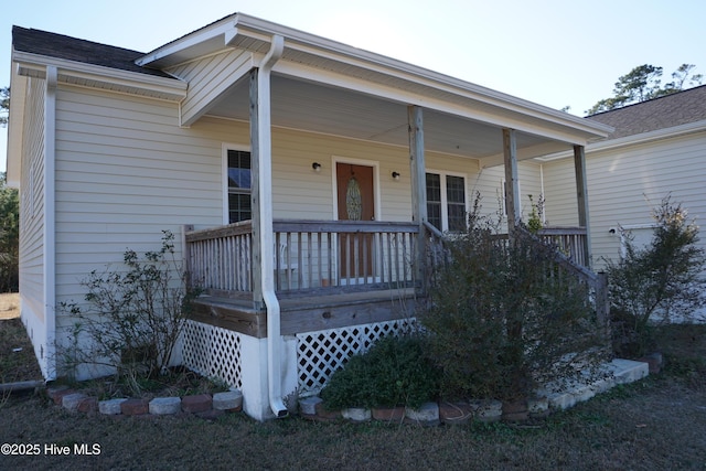 property entrance with a porch